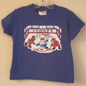 Hockey themed blue short sleeve tee shirt